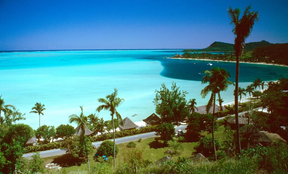 Matira Beach, Bora Bora — turquoise lagoon and coconut palms