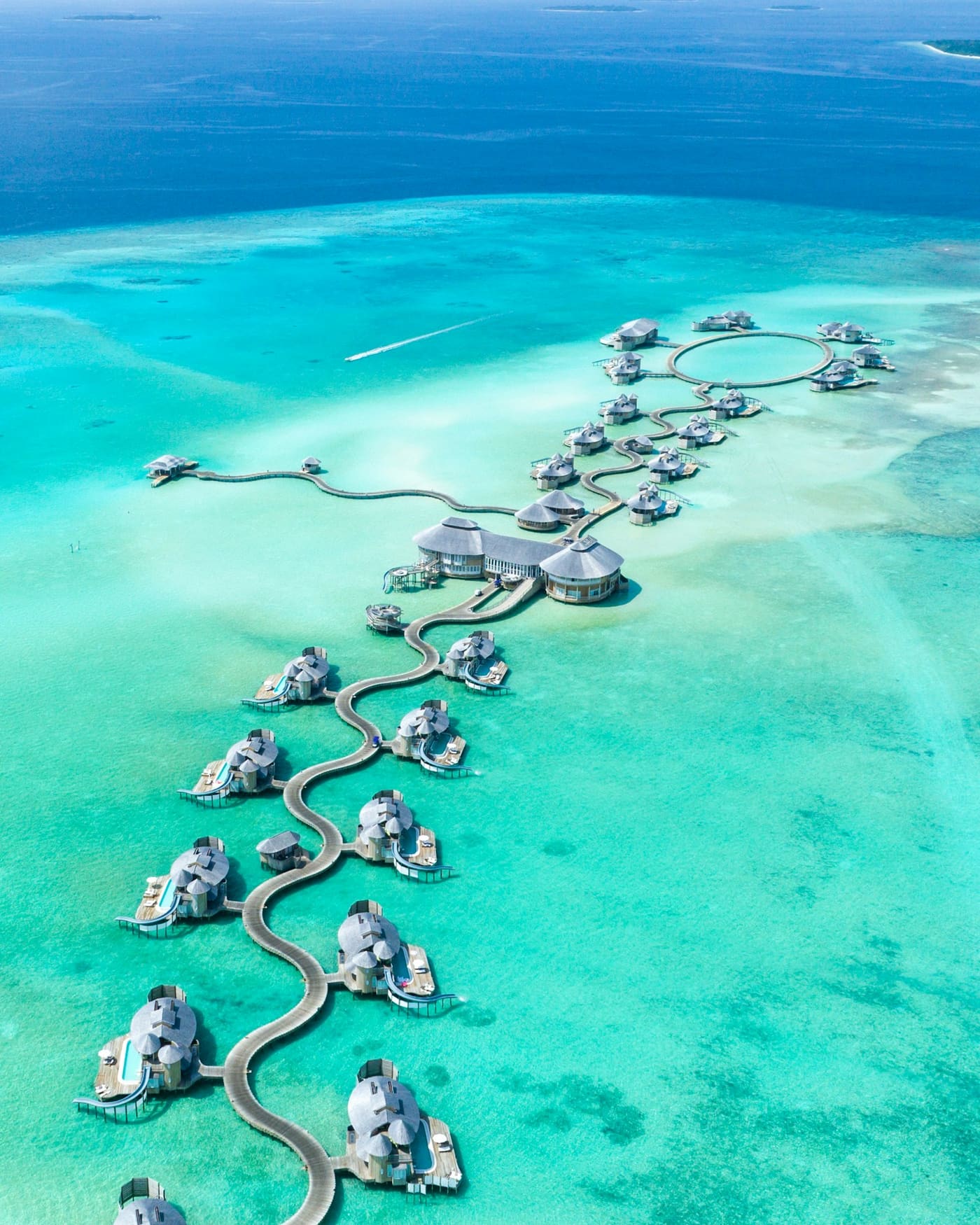 Overwater villa deck in the Maldives at sunset