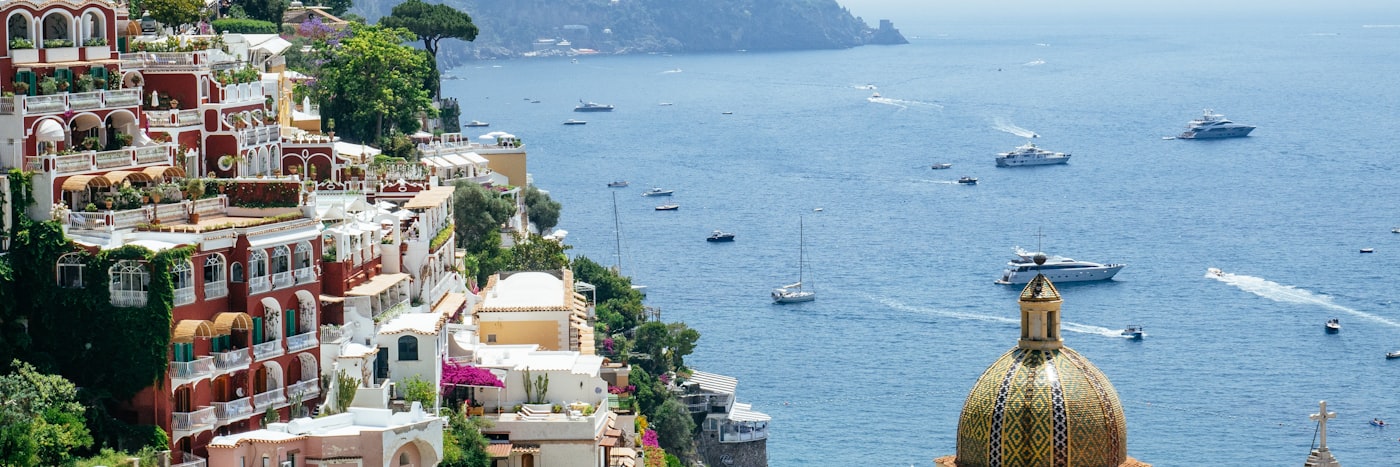 Winding Amalfi Coast road at sunset